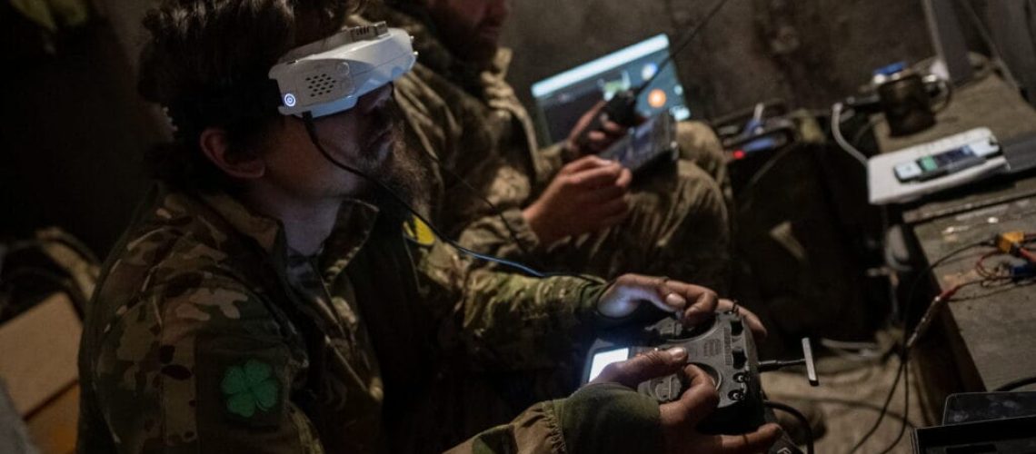 A Ukrainian serviceman of the attack drones battalion of the Achilles, 92nd brigade, operates a drone at his front line position, amid Russia's attack on Ukraine, near a Russian border in a Kharkiv region, Ukraine May 15, 2024. REUTERS/Inna Varenytsia